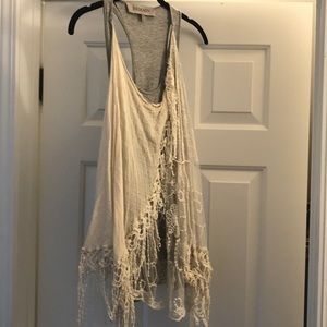 Tank with built-in scarf